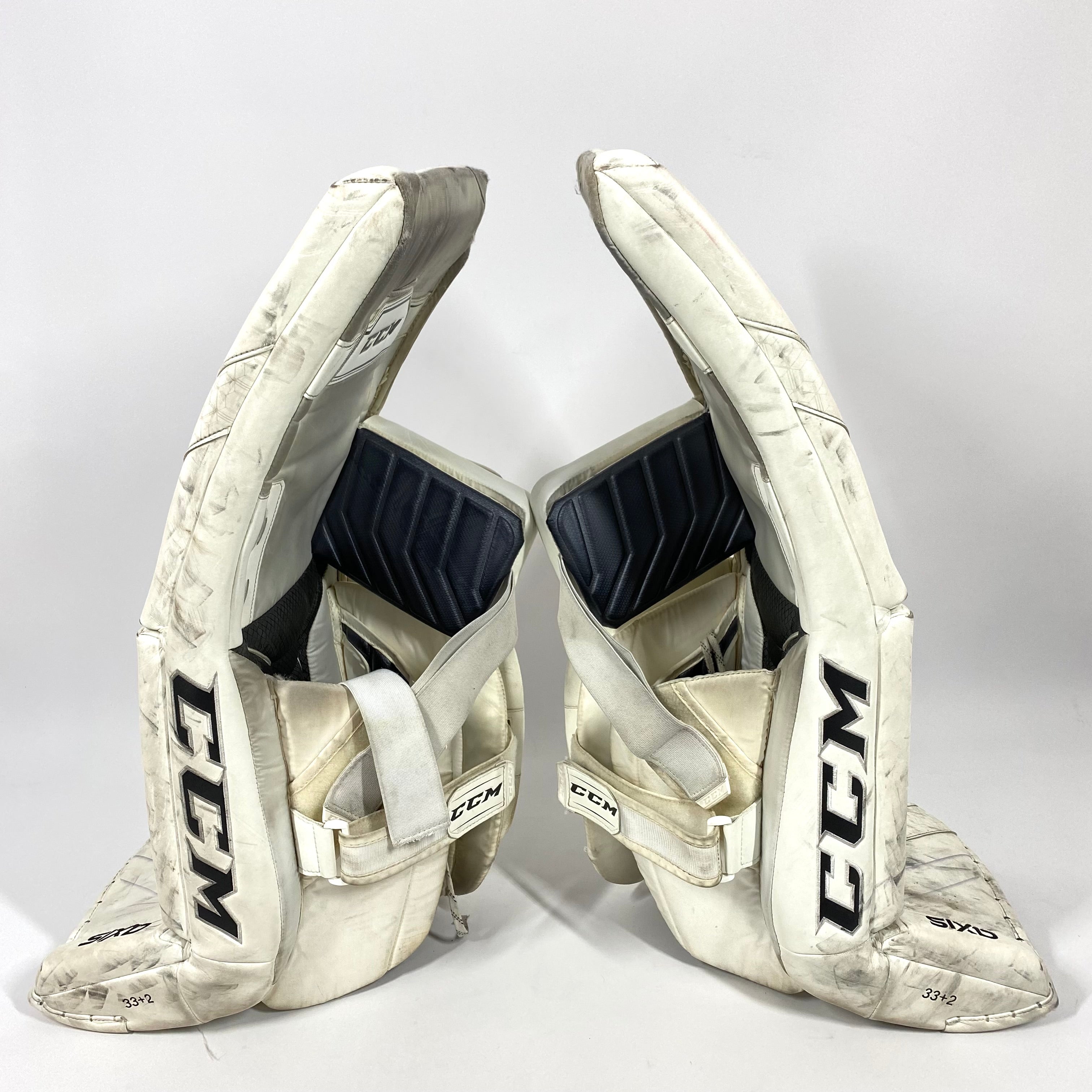 CCM AXIS - Jambières de gardien de but Pro Stock d'occasion (blanches)